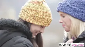 Two cute babies are having gentle