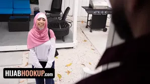 A girl wearing a hijab heard an erotic