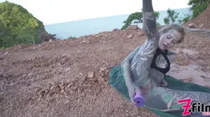 A young woman with punk look and dreads