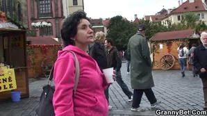 A young blonde woman wears a short skirt