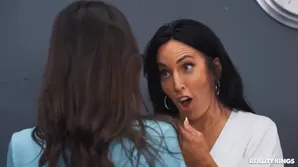 A girl pulled her head into jeans shorts