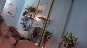 A hot coed is having fun with her