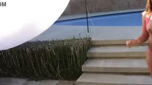 A cute girl carefully sucked her