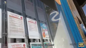 A nerdy woman with glasses is getting