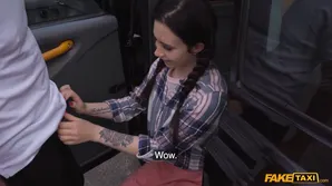 A hot chick in pigtails is having fun